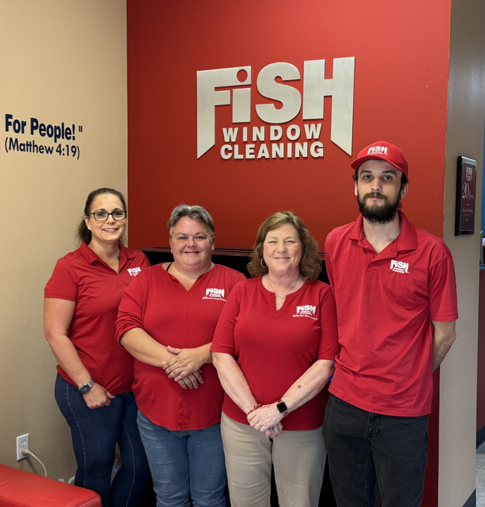 four people standing in FISH red